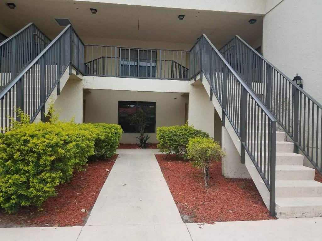 Photo of 1501 WINDORAH Way #C, West Palm Beach, FL 33411 (MLS # B26083038)