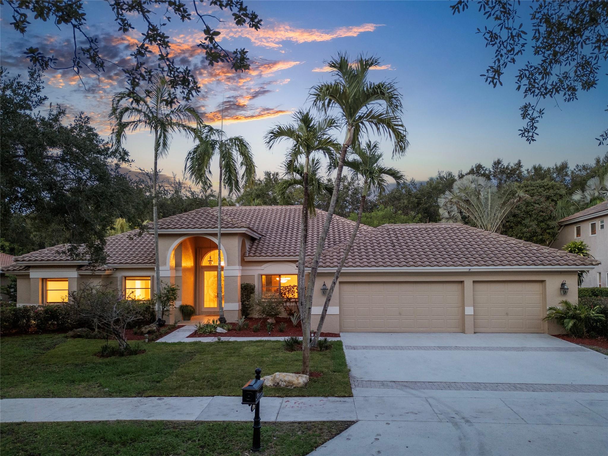 Welcome to your Florida dream in the heart of Weston! Nestled in the prestigious guard-gated Tequesta community, this spacious, beautifully updated one-story home invites you to unwind under the palms. From elegant marble floors to warm wood in the bedrooms, every detail exudes comfort and style. Soak in the sunshine in your private backyard oasis, no rear neighbors, just peace, a sparkling pool, and a screened patio perfect for outdoor dining. Imagine morning strolls through tree-lined streets to Peace Mound Park and top-rated A+ schools nearby. With a newer roof and light-filled open layout, this home is ready to elevate your lifestyle the moment you arrive. Homes in this coveted community rarely become available, don’t miss the chance to make this one your dream Home!