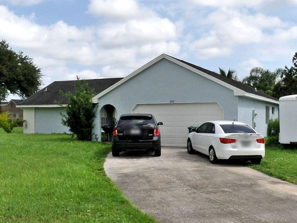 Photo of 297 SW Homeland Road, Port Saint Lucie, FL 34953 (MLS # R10775726)