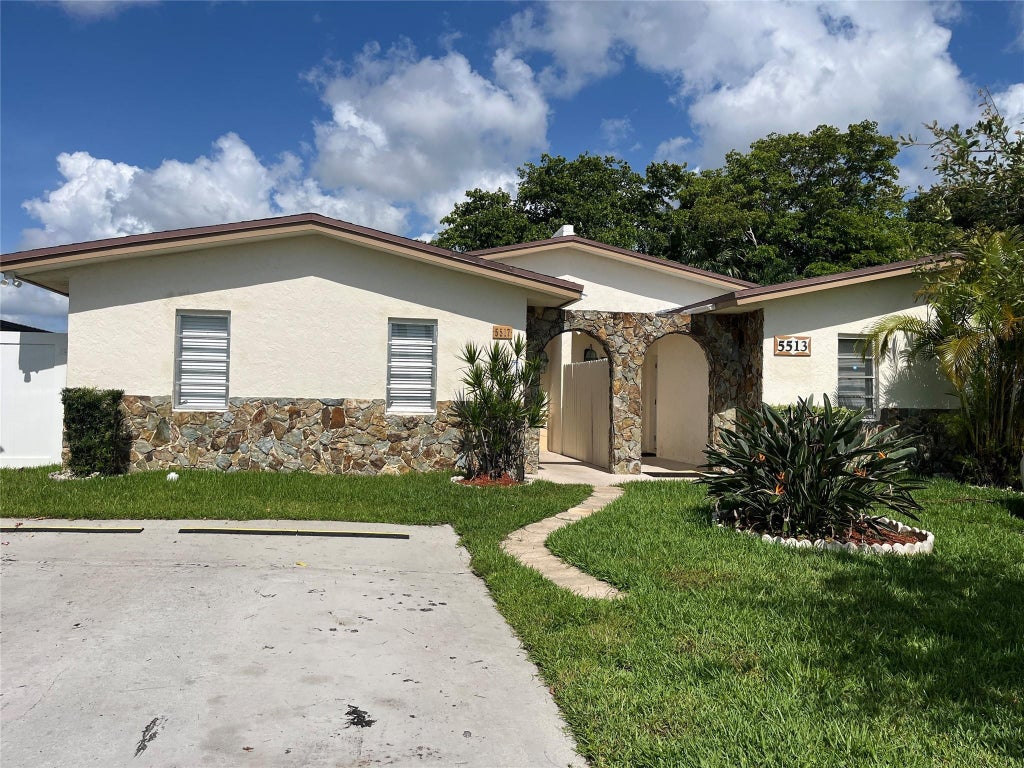 Photo of 5517 SW 24TH Avenue, Dania Beach, FL 33312 (MLS # B26072003)