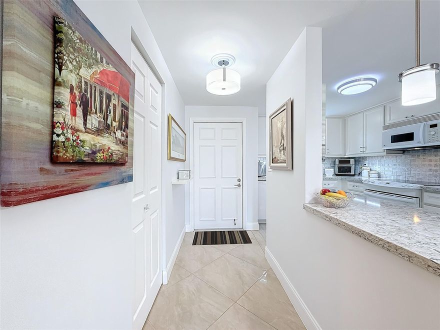 **MOVE IN READY**IMMACULATE**FULLY UPDATED/FURNISHED**2 BEDROOM/2 BATH GATED COMMUNITY**UPDATED KITCHEN WITH NEWER APPLIANCES, QUARTZ COUNTERTOPS, DINING COUNTER SPACE, ISLAND AREA, CUSTOM CABINETS WITH OVER & UNDER LIGHTING**UPDATED LUXURIOUS BATHS TILED FLOOR TO CEILING WITH PERSONAL TOUCH CABINETRY, SHOWERS, DOUBLE VANITY IN PRIMARY BATH**PRIMARY BEDROOM CUSTOM WALK-IN CLOSETS, 1 CEDAR**2ND BEDROOM WITH CUSTOM QUEEN SIZE MURPHY BED WITH BUILT-IN TV**CROWN MOLDINGS & NEW DOORS**CUSTOM WINDOW TREATMENT**PATIO HAS ROLLADEN STORM SHUTTERS & TROPICAL POOL VIEW--ACCESS FROM BEDROOM & LIVING ROOM**PORCELIAN TILE & HIGH QUALITY LAMINANT FLOORING**A/C 2023**WATER HEATER 2025**FULL SIZE WASHER/DRYER** PARKING SPACE 176**20% Down in escrow, 680 credit score min, proof of $50,000.. 55+ community