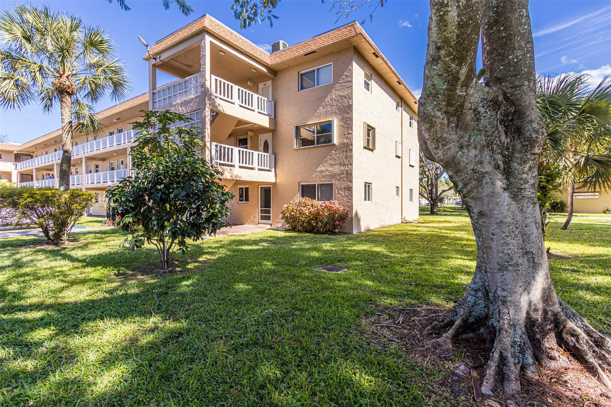 Spacious 2/2 First-Floor Corner Condo – New A/C + Lake View! Bright, move-in-ready with hurricane windows and a tiled patio with a view of garden paths and the lake. Includes water, cable, trash, and free Wi-Fi at the clubhouse. Enjoy community perks like BBQs, bingo, movie night and private security. Additional storage area. New roof and passed the 40-year inspection in 2024! Assessments have been paid by seller! Fast HOA approval! Near beach, dining & shopping! Make an offer before it is gone! NO assessments are due.