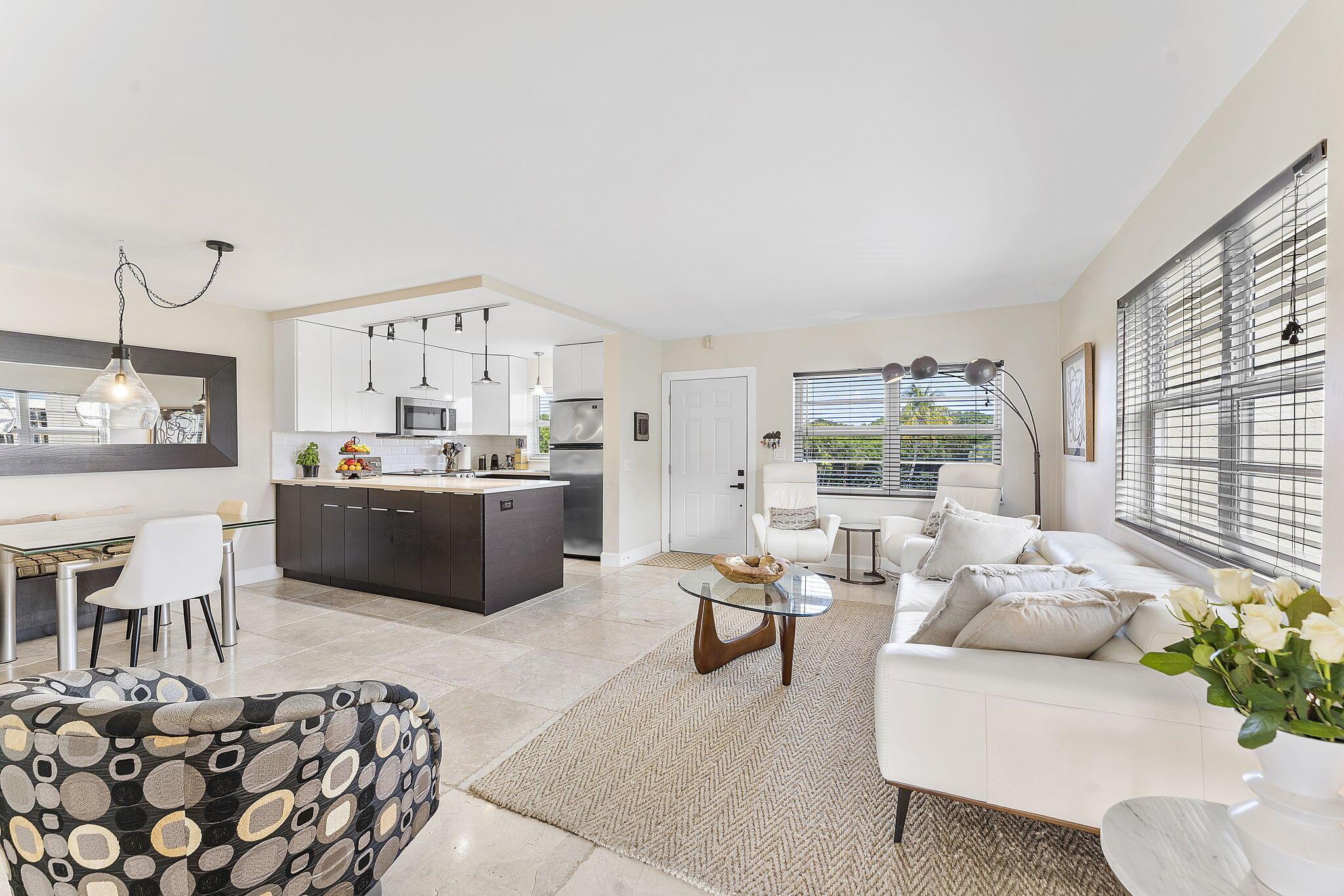 Escape to paradise in this beautifully updated and fully furnished 2-bedroom, 2-bathroom waterfront beach condo, available for off-seasonal rental. This light and bright unit features a modern open-concept kitchen, sleek finishes throughout, updated bathrooms, and stylish coastal decor with travertine floors. Enjoy serene water views from your private balcony, overlooking the marina. It's perfect for morning coffee or sunset cocktails. Located just steps from the sand, this turnkey rental offers everything you need for a relaxing beachside retreat--just bring your suitcase! Community amenities include pool, clubroom, fitness center, marina and direct private beach access. Don't miss this opportunity to experience coastal living at its finest--available for winter season starting in Jan.