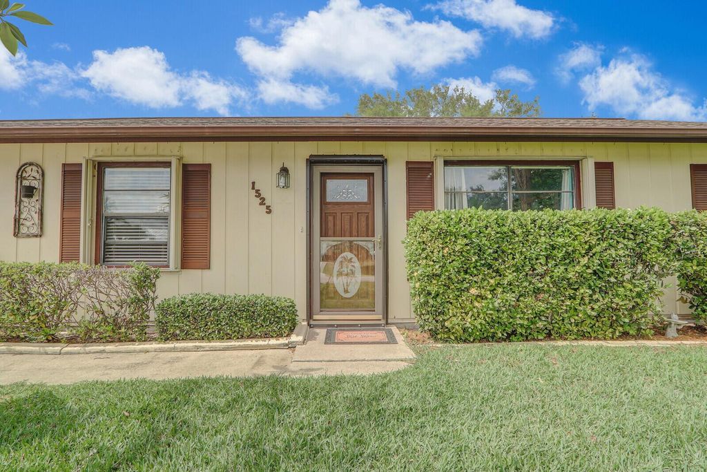 Photo of 1525 SW Pitts Avenue, Port Saint Lucie, FL 34953 (MLS # R10977092)