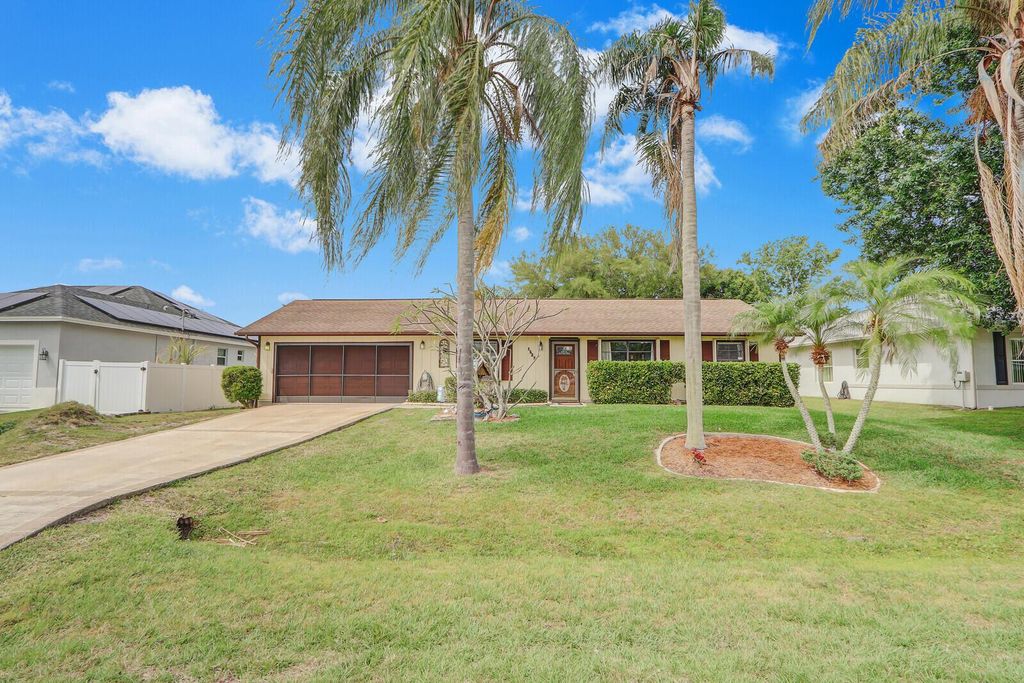 Photo of 1525 SW Pitts Avenue, Port Saint Lucie, FL 34953 (MLS # R10977092)