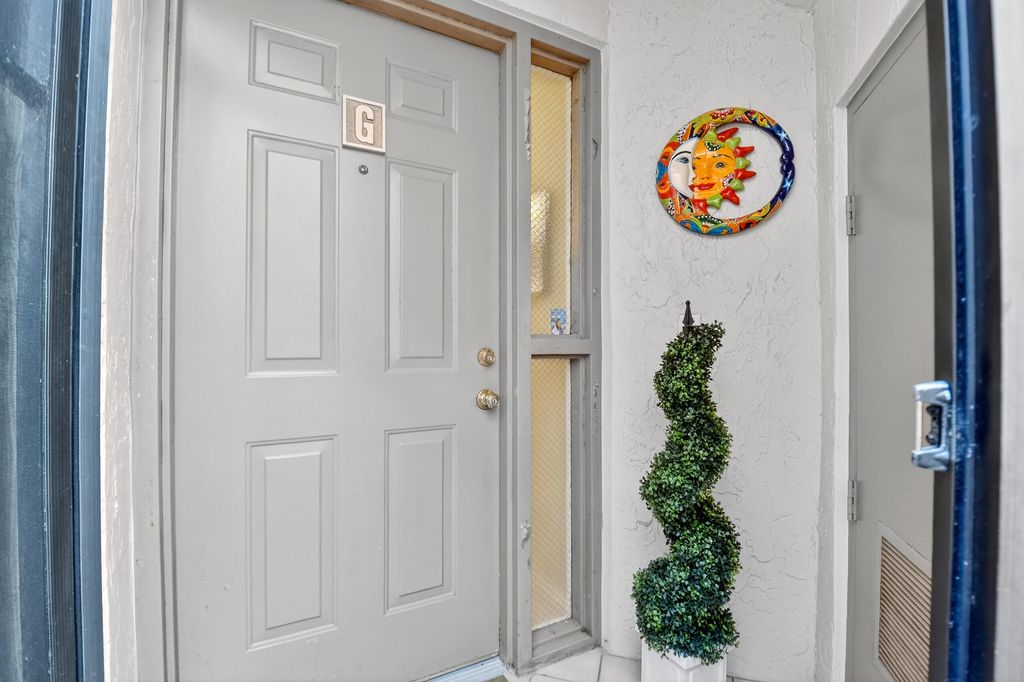 Photo of 5188 Europa Drive #G, Boynton Beach, FL 33437 (MLS # B26002305)