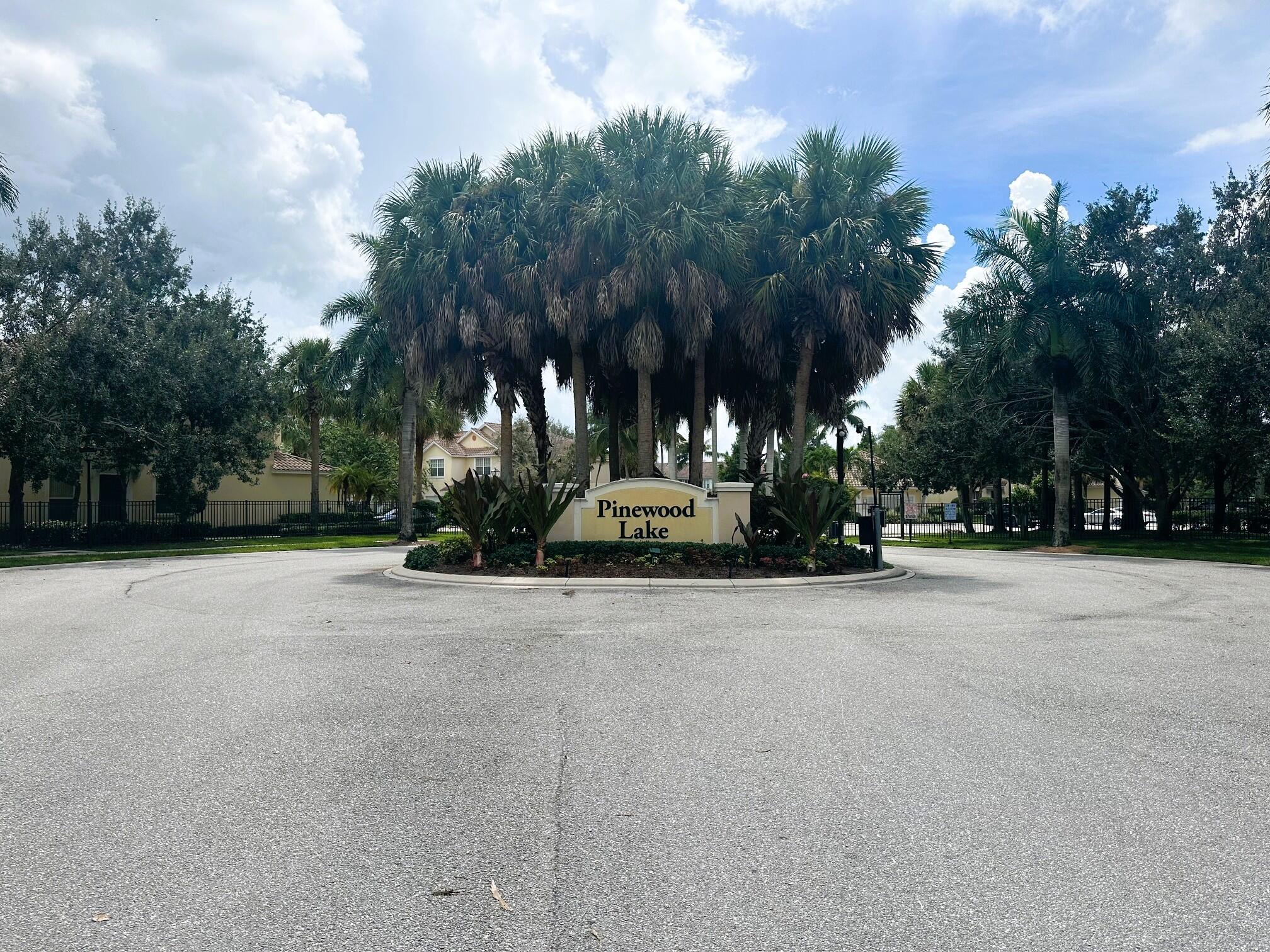 Amazing corner unit with 3 Bedrooms, 2 & half bathroom, 2 car garage in a desirable gated community. Spacious townhouse with an open floor plan, garden view and within walking distance to community pool. The remodeled kitchen features tall cabinets, quartz countertop, new appliances and custom-built desk. The 1st floor with tile flooring, half bath remodeled. The master suite includes walk-in closet, master bathroom with shower & dual vanities. The air conditioner 2018 replaced, new tankless water heater. Great location close to schools, parks, library, Publix shopping center. Easy access to Turnpike & I-95. LOW association fee includes basic cable, building exterior maintenance and exterior insurance. All ages welcome and 2 pets. Special assessment due for the roof replacement.