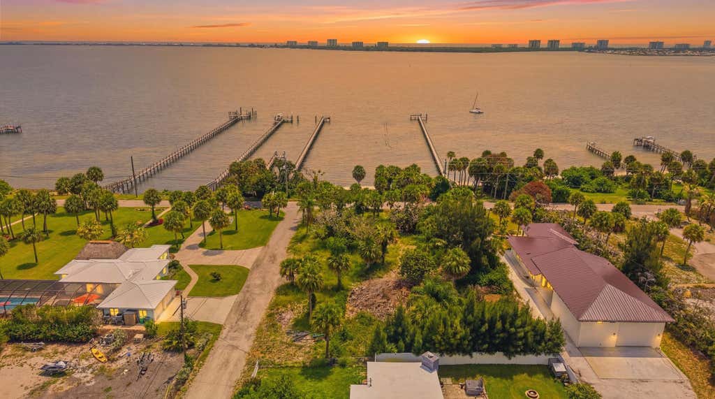 Photo of 12349 S Indian River Drive, Jensen Beach, FL 34957 (MLS # B26045979)