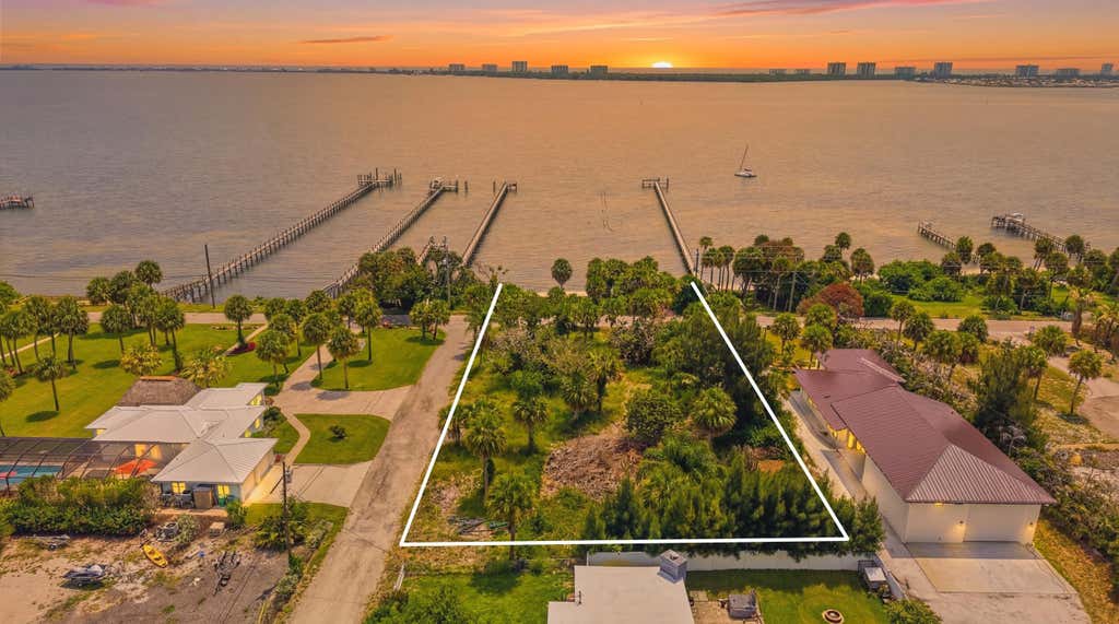 Photo of 12349 S Indian River Drive, Jensen Beach, FL 34957 (MLS # B26045979)