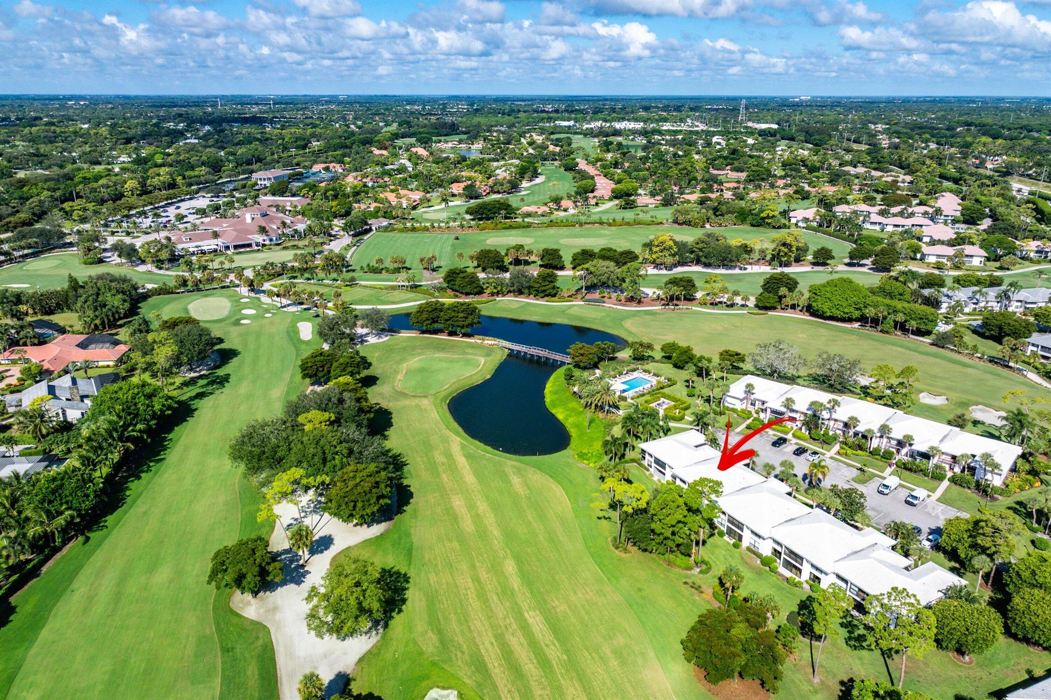 Enjoy spectacular double fairway views from this 3 BR 2 BA 1st floor condo located in the desirable Blue Heron section. Featuring wood flooring, this spacious condo has many great features including an updated kitchen with extended cabinetry, granite countertops, stainless appliances & tile backsplash. Bathrooms are updated. The bedrooms have a unique configuration. The 2nd BR, facing the golf course, is perfect for guests providing complete privacy & an adjacent bathroom. The 3rd BR, with floor to ceiling bookcases, can be used as a den also. The Club at Quail Ridge provides world class amenities including 2 championship golf courses, a new racquet facility encompassing tennis & pickleball, fitness center, both fine & casual dining and round the clock security.