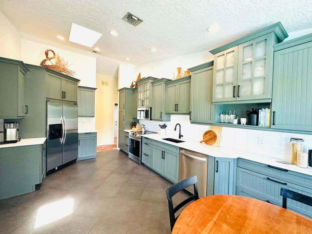Photo of 13708 Folkestone Circle, Wellington, FL 33414 (MLS # B26063914)