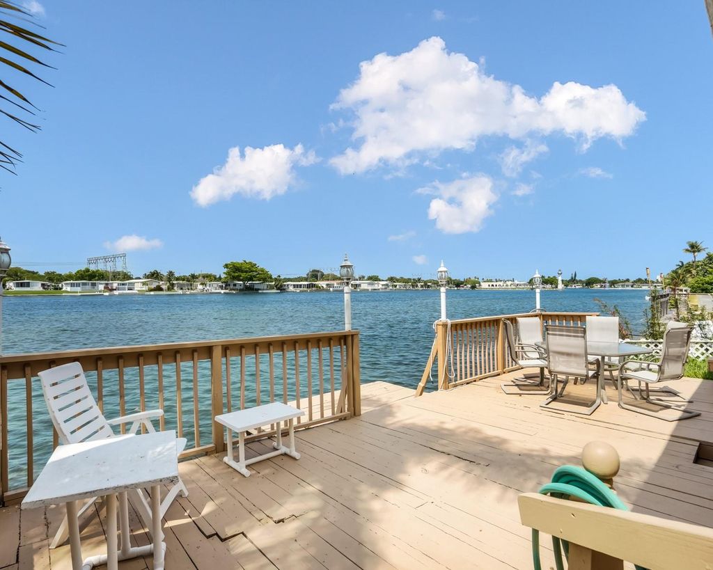 Photo of 3033 Lakeshore Dr, Dania Beach, FL 33312 (MLS # F10540981)