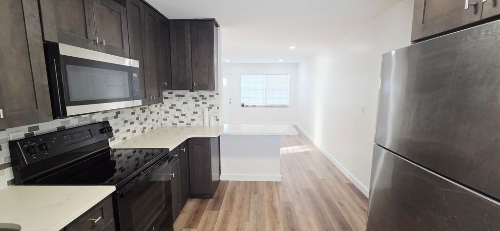 Photo of 765 W 7th Street #A, Riviera Beach, FL 33404 (MLS # R11163628)