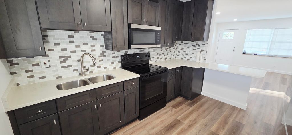 Photo of 765 W 7th Street #A, Riviera Beach, FL 33404 (MLS # R11163628)