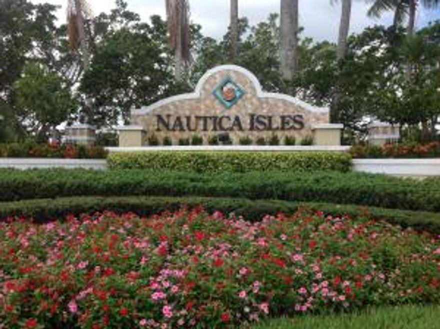 Look no further! This beautifully updated & meticulously maintained 3 BR 2.5 Bath 2 car garage home located in Nautica Isles has it all! Newly updated kitchen cabinets, snack bar overlooking the family room, Stunning laminate wood floors & custom made wrought iron railings  lead you to the second floor. The Master Suite has plenty of storage with his and hers closets, spacious bathroom with updated cabinets, dual sinks, Roman tub, and separate shower. Crown molding adds the finishing touch throughout the home. Freshly painted exterior, New AC, dryer, and refrigerator. Resort style amenities including pool, clubhouse, tennis, soccer, basketball and tot lots. Close to shopping, beaches, entertainment and schools in walking distance!