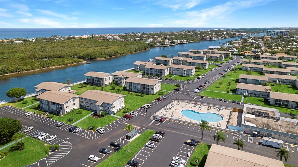 Discover your dream retirement lifestyle in this stunning 55 and older condo situated on the intracoastal. Step inside to find an inviting living space boasting updated flooring installed in 2015. The unit features a 2018 AC unit and water heater, ensuring comfortable living year-round. The kitchen includes a 2013 fridge, 2010 stove, and a 2018 microwave. The electrical panel was also updated in 2018. Enjoy the community pool and short or long walks around the community. Sterling Village is the perfect spot to call home.Don't miss out on the opportunity to make this condo your own! Come relax and unwind!