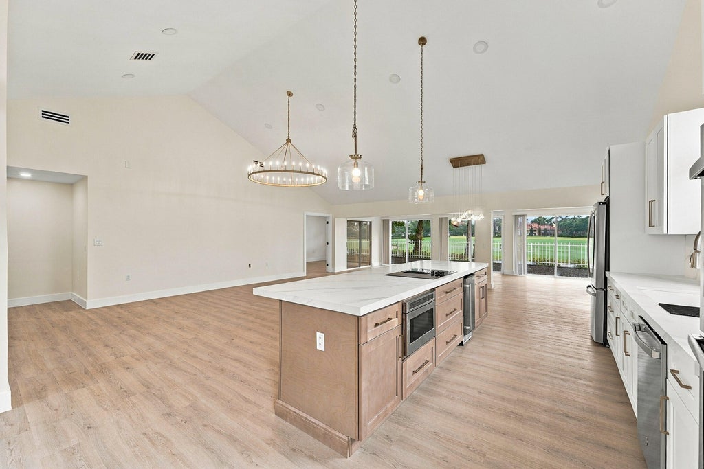 Photo of 2398 Saratoga Bay Drive, West Palm Beach, FL 33409 (MLS # B26091225)