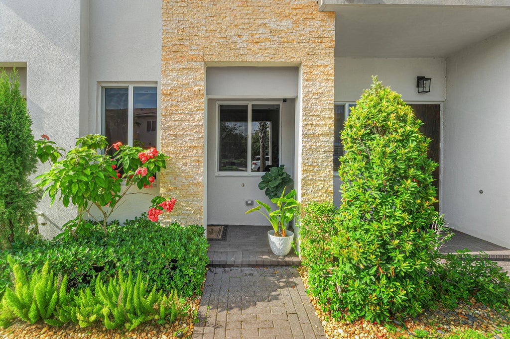 Photo of 610 Pioneer Way, Royal Palm Beach, FL 33411 (MLS # B26069753)