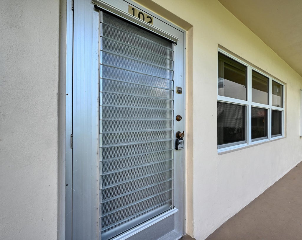Photo of 102 COVENTRY E, West Palm Beach, FL 33417 (MLS # B26089642)