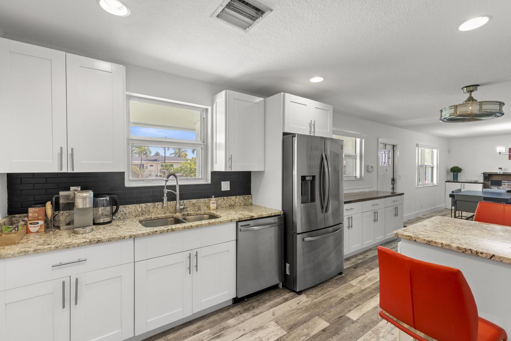 Photo of 944 Hansen Street, West Palm Beach, FL 33405 (MLS # B26005667)