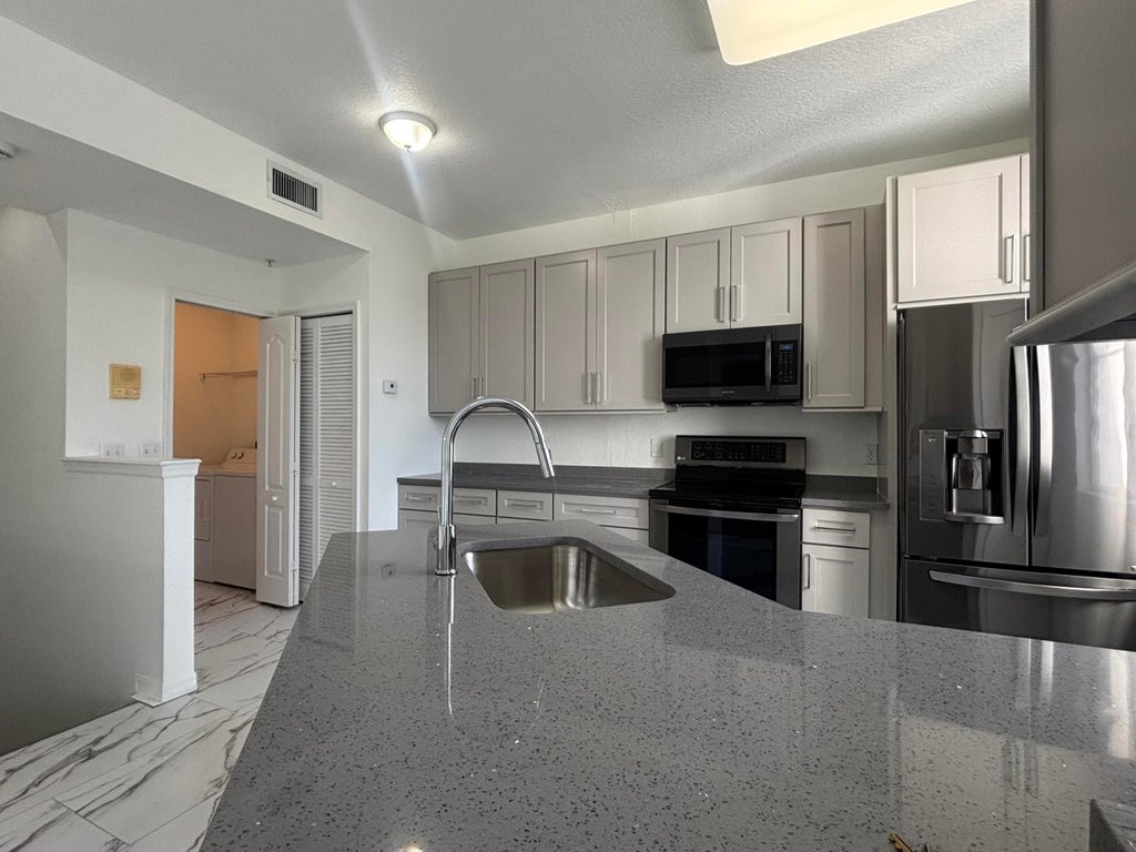 Photo of 11035 Legacy Boulevard #301, Palm Beach Gardens, FL 33410 (MLS # B26015890)