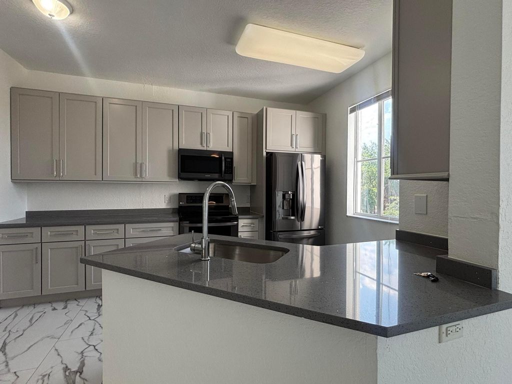 Photo of 11035 Legacy Boulevard #301, Palm Beach Gardens, FL 33410 (MLS # B26015890)