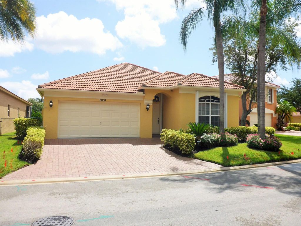 Photo of 8058 Via Hacienda, Riviera Beach, FL 33418 (MLS # R10973027)