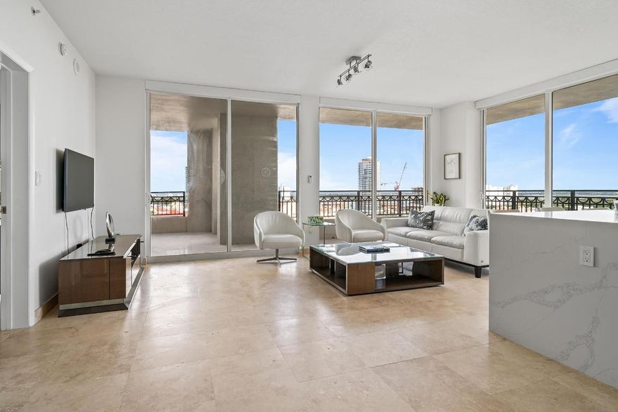 Breathtaking Intracoastal and Ocean views from this modern, updated, 14th floor Southeast Corner 3 bedroom unit at Cityplace South Tower. Offered furnished turnkey, just bring your toothbrush! All new Quartz countertops, sinks, and hardware in Kitchen and Bathrooms. Tile Floors throughout. Motorized blinds in every room. Huge wraparound terrace. Includes two premier lower level parking spaces and a double wide storage cage. CityPlace South Tower is a full service luxury building in the heart of Downtown with 24 hour doorman, valet, resort pool, gym, club room, and spa facilities. Beautifully refreshed new building common areas with NO assessment. Located across from City Place with an Equinox coming soon, RH, and walkable to countless restaurants, shops, the waterfront, Clematis st, Brightline Station, and Palm Beach Island just over the bridge.