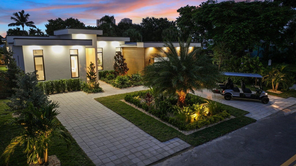 Photo of 301 Cascade Lane, Palm Beach Shores, FL 33404 (MLS # R11028692)