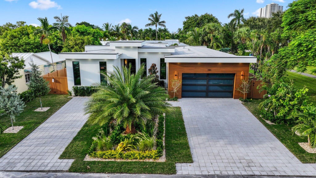 Photo of 301 Cascade Lane, Palm Beach Shores, FL 33404 (MLS # R11028692)