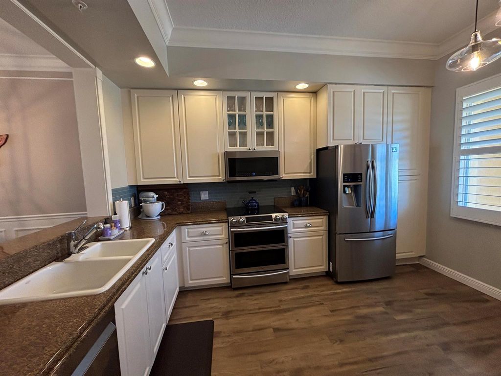 Photo of 30 Harbour Isles 305 Drive W #305, Fort Pierce, FL 34949 (MLS # R11105298)