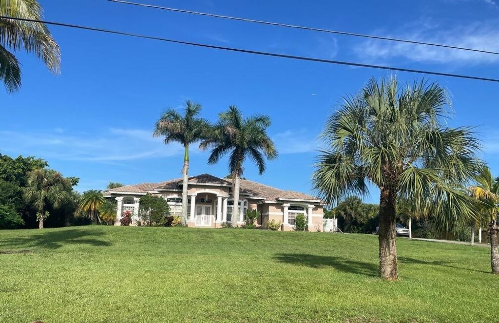 Photo of 16146 72nd Drive N, Palm Beach Gardens, FL 33418 (MLS # R10760379)