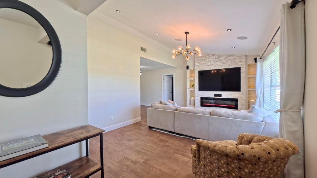 Photo of 1381 Wyndcliff Dr, Wellington, FL 33414 (MLS # B26020573)