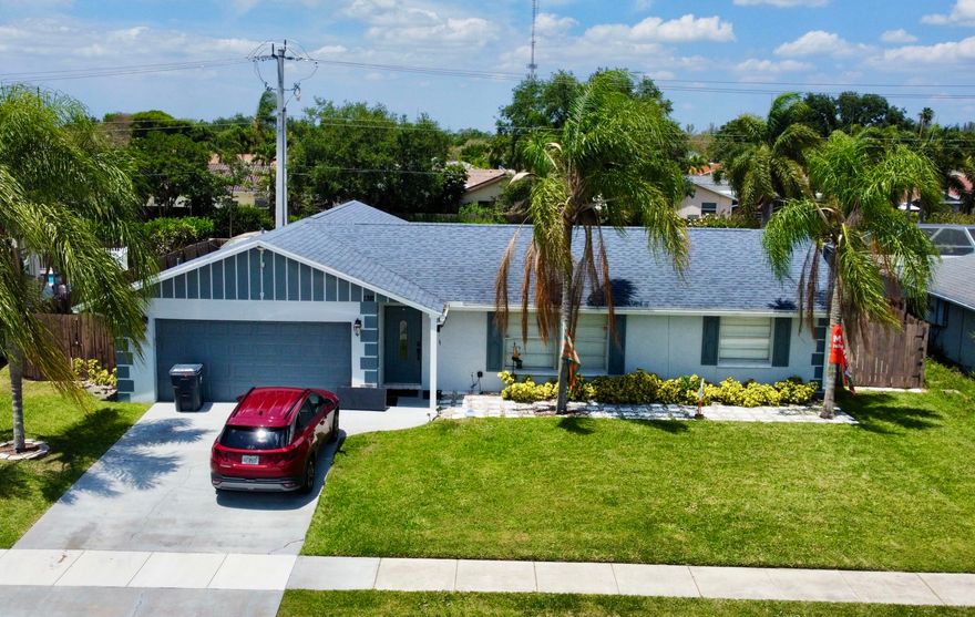Welcome to this updated 4-bedroom, 2-bath home in the heart of Wellington, with no HOA. This home features a desirable split floor plan with a spacious primary suite, walk-in closet, and a fully renovated main bathroom 2024. The secondary bathroom was updated in 2023. The fully remodeled kitchen serves as the centerpiece of the home and a custom-built entertainment wall with an integrated sound system. Major upgrades, including French doors, exterior paint, a new A/C condenser, fully serviced indoor air handler, and complete A/C duct replacement in 2025. New pool pump (2025) and Roof is 2018. Private backyard featuring a pool, built-in fire pit, and designated boat or RV parking.Property is tenant occupied until mid-June. Please do not disturb tenants. Showings by appointment