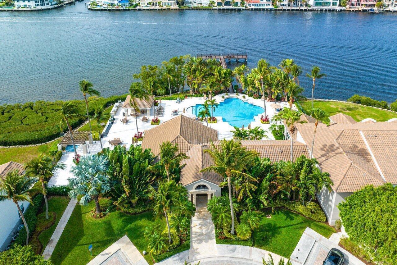 Live the coastal lifestyle in this spacious 2BR/2BA condo located in Highland Beach's premier waterfront community. Featuring a split floor plan, impact windows/doors, marble floors, and a freshly painted interior, this unit is move-in ready--unfurnished or turnkey. The large updated kitchen boasts white quartz counters, stainless appliances, and a snack bar open to the living area. Enjoy the convenience of a full-size laundry room/pantry, Nest thermostat, custom closet systems, and a dedicated wine fridge for your favorite vintages. Catch a charming ''peek-a-blue'' of the ocean--just enough to remind you it's there without requiring SPF. A/C and hot water heater are newer. Upscale, serene, and steps from the sand. No rental waiting period makes this a great investment.2 pets OK, all age..
