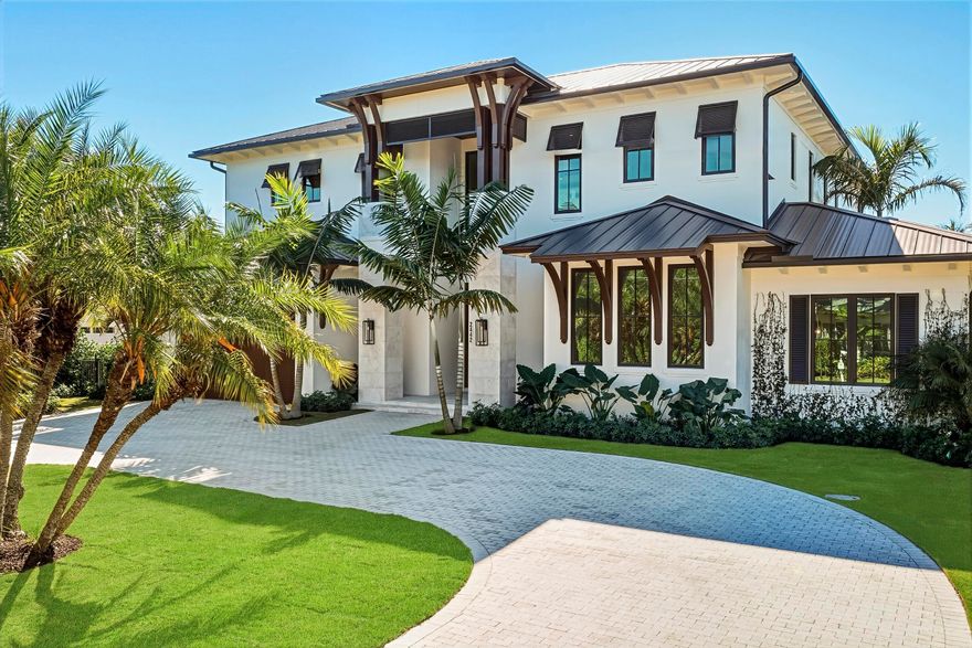 A rare expression of modern coastal luxury, this brand-new 2026 Foster Banyan estate sits on 71 feet of pristine waterfront with direct Intracoastal and ocean access--offering the ultimate South Florida boating lifestyle with no fixed bridges. Designed for both grand entertaining and everyday comfort, this CBS two-story residence blends architectural elegance with resort-style outdoor living. Custom solid mahogany double doors open to light-filled interiors featuring wide-plank white oak floors, stained beam accents, expansive picture windows, and pocket sliders that dissolve the boundary between indoors and out. The showpiece kitchen stuns with Bently Gold marble countertops and backsplash, a statement island, Thermador appliance suite, custom pantry/coffee station, and an adjoining wet bar with dual wine coolers and ice maker.
The outdoor experience rivals a private resort--marble decking surrounds a heated salt- chlorinated infinity pool and spa, summer kitchen with built-in grill, lush tropical landscaping, new seawall, turf yard, and fully fenced grounds.
The first-floor primary retreat offers its own foyer, morning bar, dual walk-ins, and spa bath with soaking tub and dual rain showers. Upstairs, guest suites, a VIP suite, and an oversized loft open to covered balconies with water views.
With impact glass, surround sound, generator stub, tankless gas systems, 3 A/Cs, and smart pre- wiring throughout, every detail reflects thoughtful luxury and timeless coastal sophistication.
