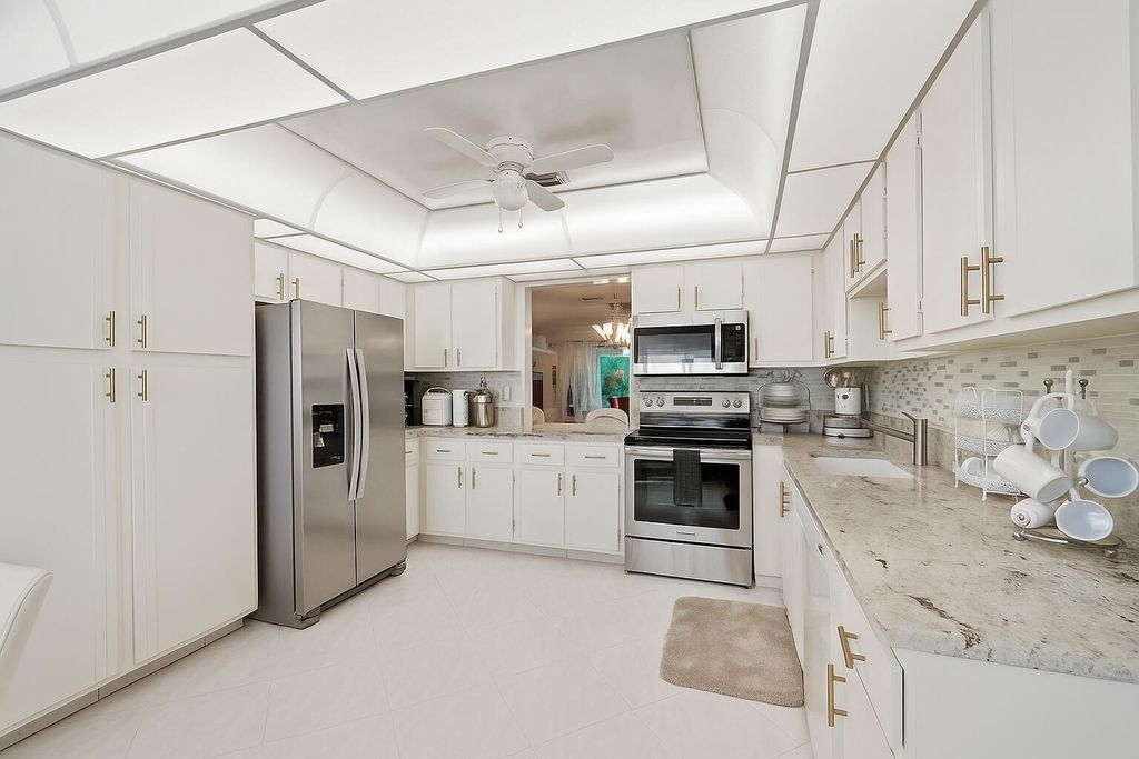 Photo of 5010 Privet Place #101, Delray Beach, FL 33484 (MLS # B26031237)
