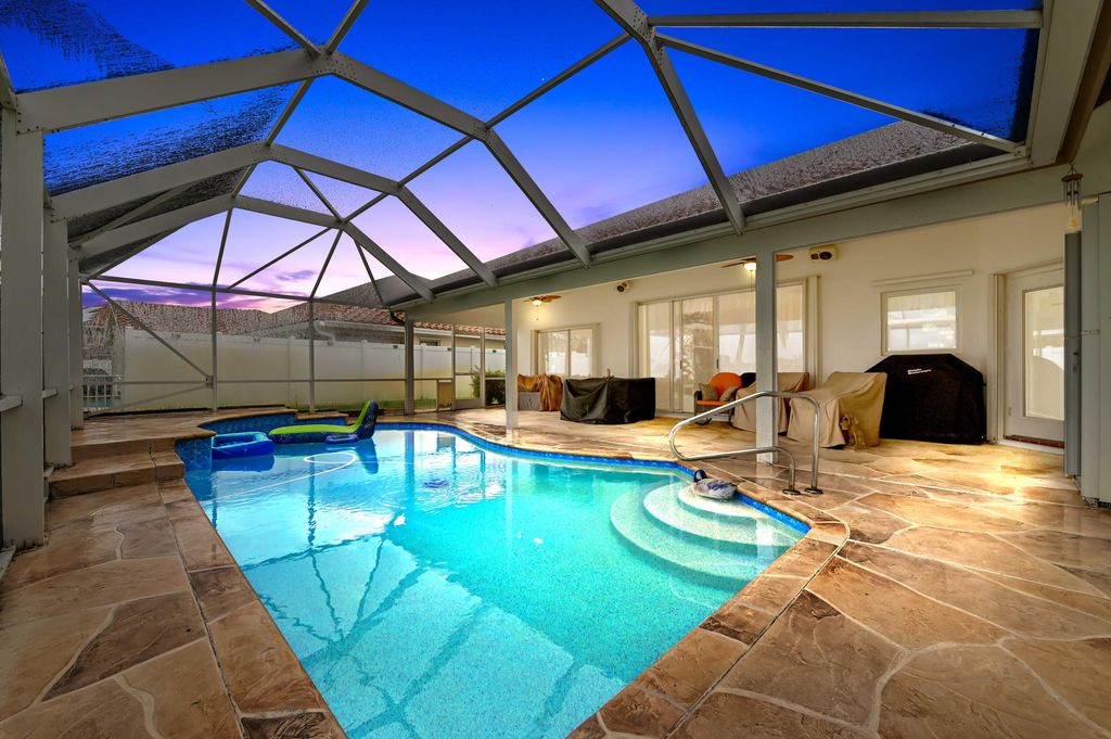 Photo of 7734 Belmont Drive, Lake Worth, FL 33467 (MLS # B26028655)