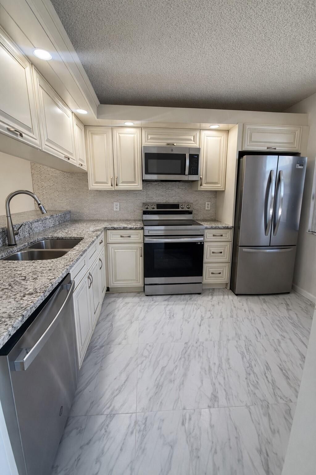 Photo of 3826 Whitehall Drive #305, West Palm Beach, FL 33401 (MLS # R11166693)