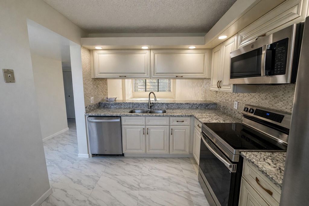 Photo of 3826 Whitehall Drive #305, West Palm Beach, FL 33401 (MLS # R11166693)