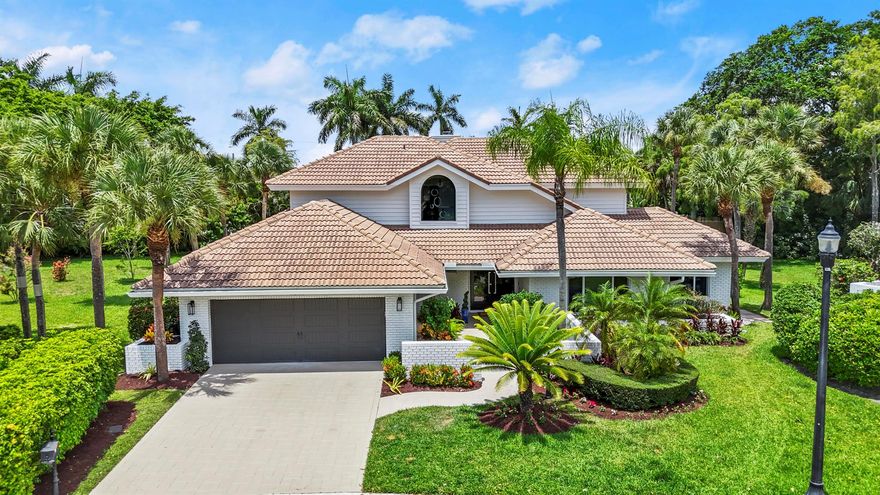 ENJOY THIS PROPERTY AS IT EXUDES A VACATION VIBE.  EACH WING PROVIDES PRIVACY IN THIS 4 BEDROOM + OFFICE, 3 1 2/ BATH HOME.  THE PRIMARY BEDROOM LOCATED ON THE 2ND FLOOR FEELS LIKE A TREETOP RETREAT WITH BALCONY - ALSO HAS A SITTING AREA.  ADDITIONAL BEDROOM AND FULL BATHROOM UPSTAIRS.  MODERN GLASS STAIRCASE.  NEW KITCHEN WITH QUARTZITE AND 2 OVENS.  PRIVATE OFFICE OR PLAYROOM ON MAIN LEVEL WITH SLIDING DOORS LEADING TO PATIO.    THE BACKYARD FEATURES A HEATED POOL WITH JACUZZI, COMPLETE MARBLE PATIO, AND SUMMER KITCHEN.  PLENTY OF OVERHANG FOR DINING AND PLAYING.  IMPACT GLASS THROUGHOUT - EXCEPT 1 WINDOW IN GARAGE.  CUL DE SAC LOCATION.  MASSIVE SIDE YARD.  WOOD BURNING FIREPLACE IN FAMILY ROOM.