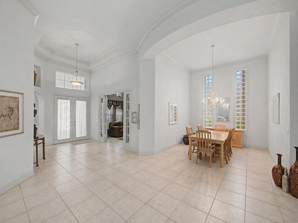 Photo of 121 ORCHID CAY Drive, Palm Beach Gardens, FL 33418 (MLS # B26078492)