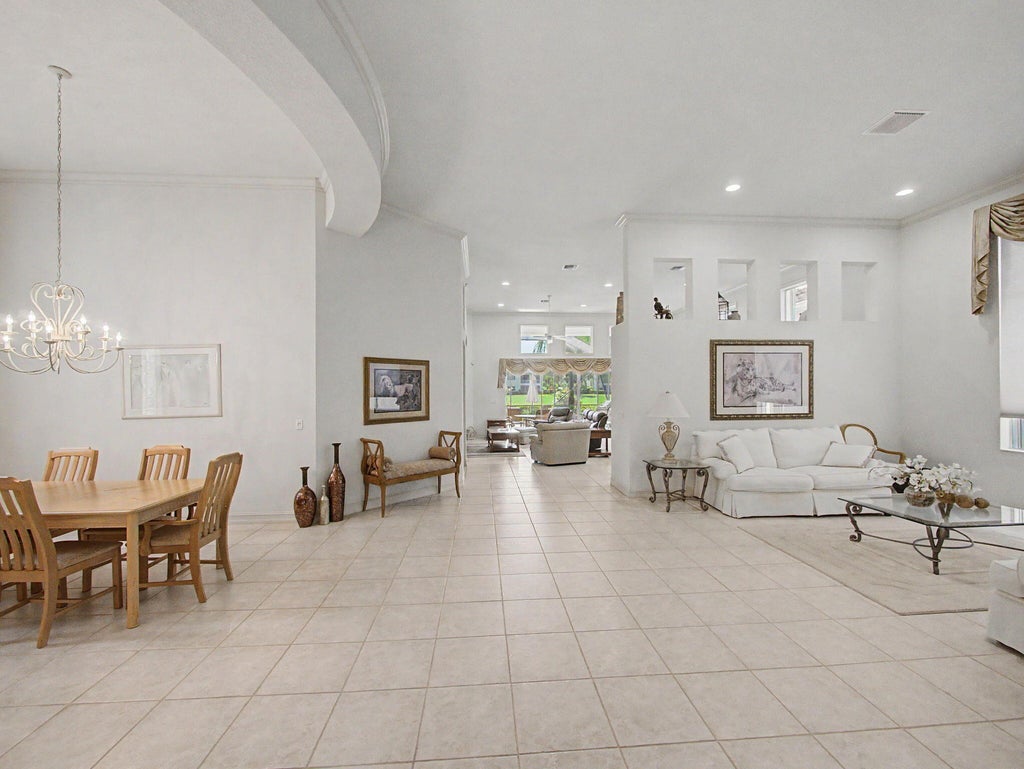 Photo of 121 ORCHID CAY Drive, Palm Beach Gardens, FL 33418 (MLS # B26078492)
