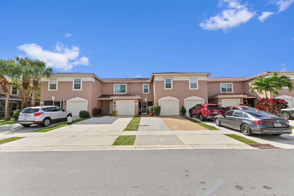 Photo of 5280 Pine Meadows Road, Lake Worth, FL 33463 (MLS # R11066433)