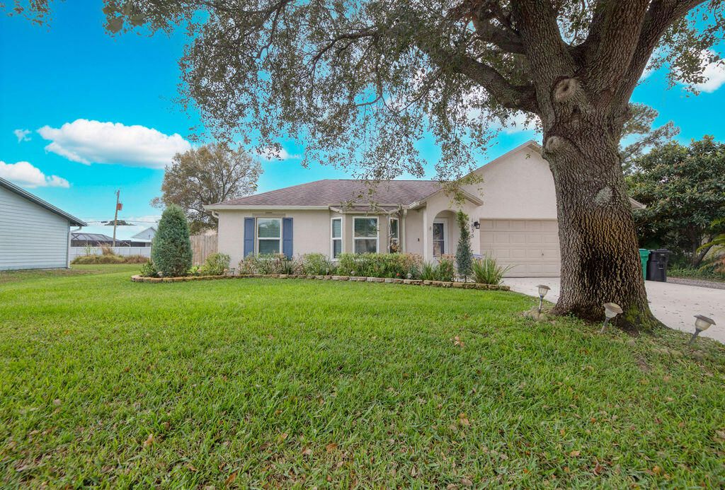 Photo of 1838 SW Notre Dame Avenue, Port Saint Lucie, FL 34953 (MLS # R11155151)