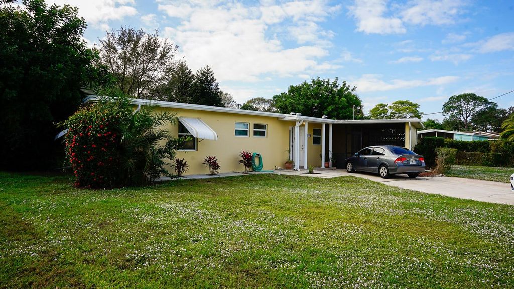 Photo of 150 S Naranja Avenue S, Port Saint Lucie, FL 34983 (MLS # R10941860)