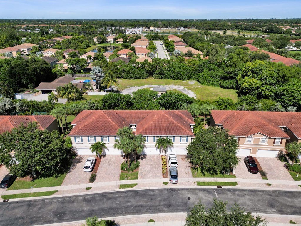 Photo of 4603 Cohune Palm Court, Greenacres, FL 33463 (MLS # B26068495)