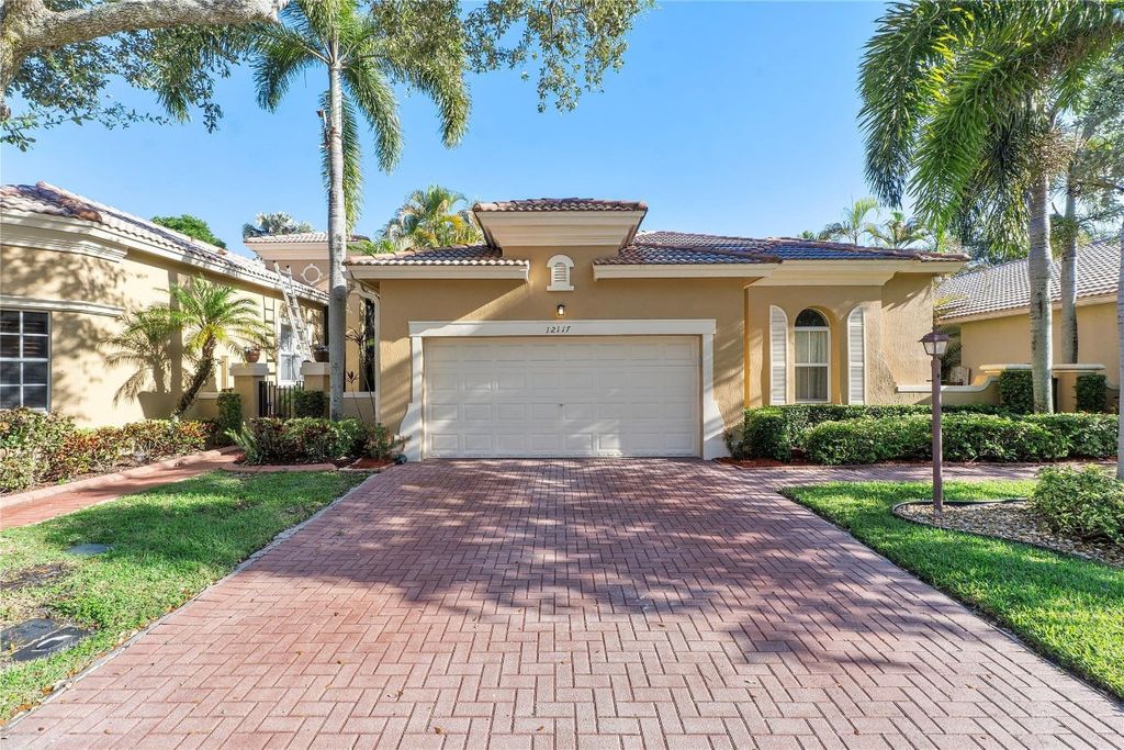 Photo of 12117 NW 59th Street, Coral Springs, FL 33076 (MLS # F10517270)