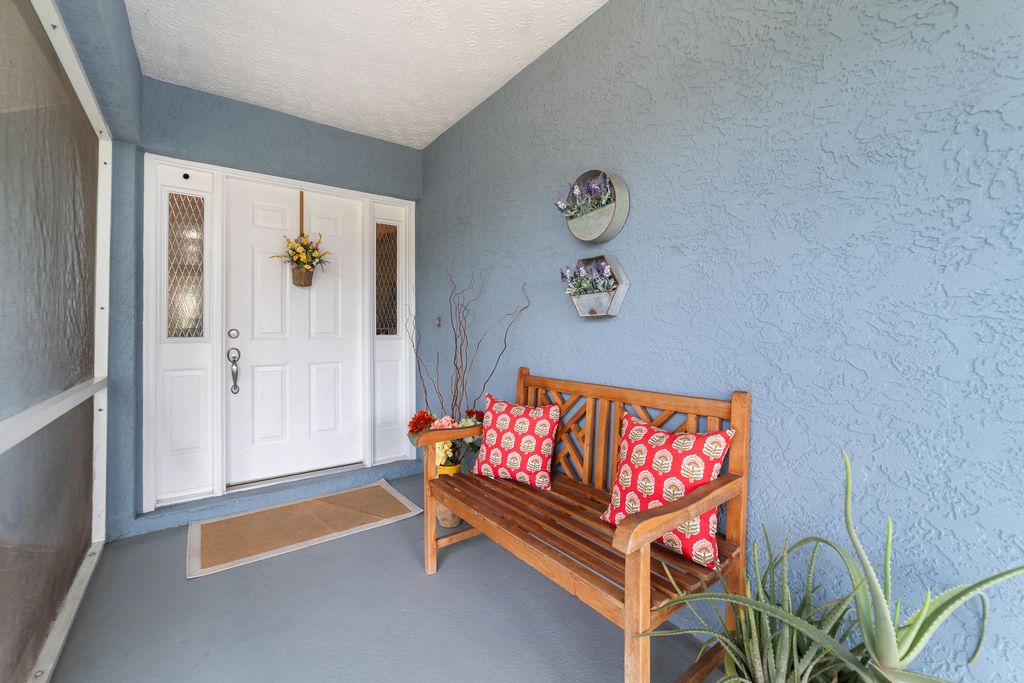 Photo of 817 NW Archer Avenue, Port Saint Lucie, FL 34983 (MLS # B26009765)