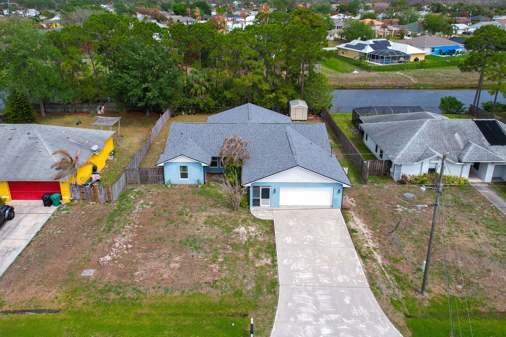 Photo of 817 NW Archer Avenue, Port Saint Lucie, FL 34983 (MLS # B26009765)